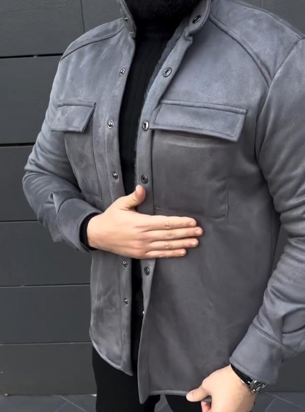 Casual men's single-breasted solid leather jacket with velvet lapels